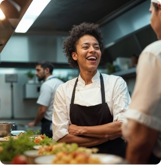 female chef during diner service